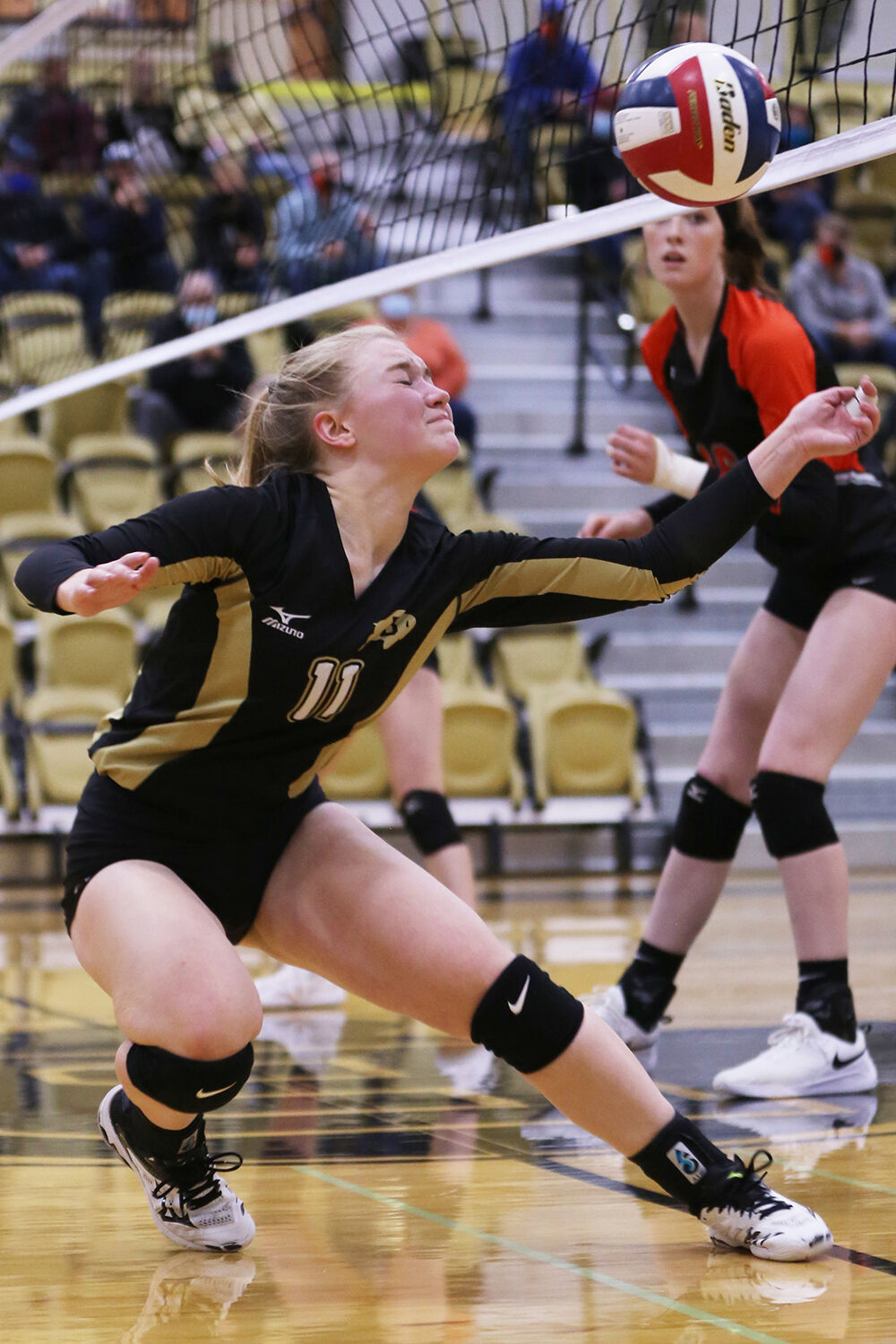 Cassie Downare dives to recover a pass